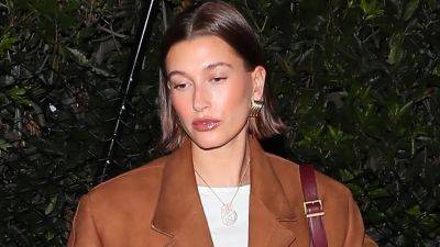 Hailey Bieber Declares Brown the New Black in Tiny Leather Miniskirt - www.glamour.com - California - Beyond