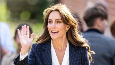 Kate Middleton Loves Her Blue Pinstriped Suit So Much She Wore It Twice in One Week - www.glamour.com - Britain - county Cooper