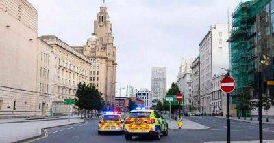 Major police incident in Liverpool city centre as man left fighting for life and woman arrested - www.manchestereveningnews.co.uk - city Liverpool