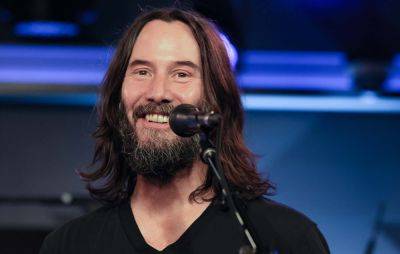 Keanu Reeves spotted playing catch with nine-year-old boy before concert - www.nme.com - Texas