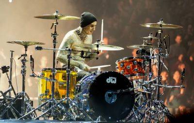 Fans react to Travis Barker playing drums in hospital after son’s birth - www.nme.com