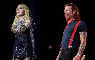 Madonna and Eagles Of Death Metal pay tribute on anniversary of Paris terror attacks - www.nme.com - France - Paris