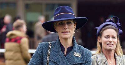 Zara Tindall looks chic in navy hat and coat at Cheltenham races - www.ok.co.uk