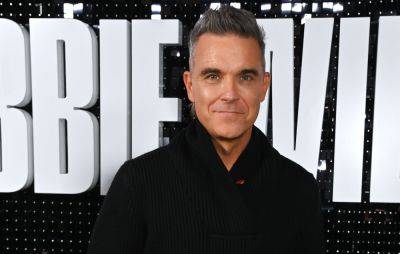 Robbie Williams opens up about past self-harming: “It was sad – I had no resistance” - www.nme.com