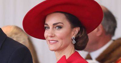 Kate Middleton ravishing in red designer cape with statement bow as she and William arrive at Horse Guards Parade - www.ok.co.uk - Scotland - South Korea - North Korea - county King And Queen