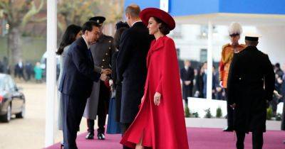 Kate Middleton performs silent gesture for King as she turns head in dazzling red cape - www.dailyrecord.co.uk - Scotland - South Korea