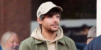 Louis Tomlinson Takes a Break From Tour, Hangs Out at Pub With Friends - www.justjared.com - London