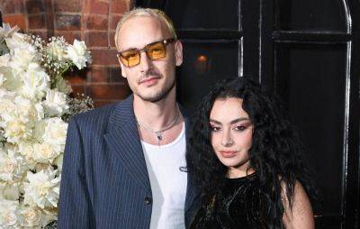 Charli XCX announces engagement to The 1975’s George Daniel - www.nme.com - Rome