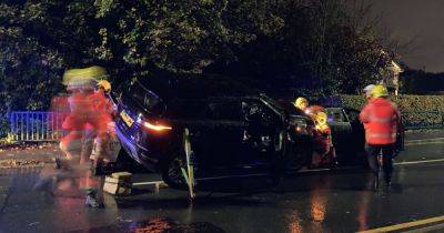 Range Rover lands sideways on car in dramatic crash as emergency services close road - www.manchestereveningnews.co.uk - Manchester