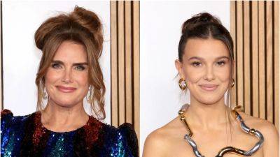 Millie Bobby Brown and Brooke Shields Prove a Messy Bun Is Black Tie - www.glamour.com
