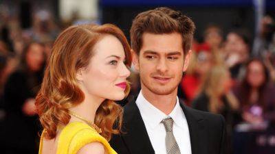 Fans Think Emma Stone Had the Best Reaction to Seeing Ex Andrew Garfield at a ‘Poor Things’ Premiere - www.glamour.com - county Garfield