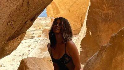 Halle Berry Doesn't Need a Reason to Wear Lingerie in the Desert - www.glamour.com