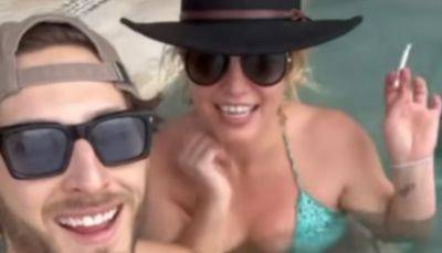 Britney Spears' Mystery Man in Pool Video Revealed: 'Paradise Playing With My Baby' - www.justjared.com