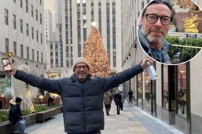 Hugh Jackman scolded by security for getting too close to Rockefeller Center Christmas Tree - nypost.com