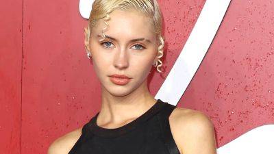 Jude Law's Daughter Iris Law's Low-Rise Red Carpet Look Literally Screams ‘SEX’ - www.glamour.com - Britain - South Korea - city Seoul, South Korea