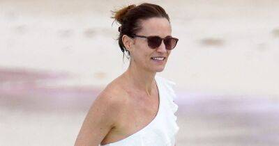 Pippa Middleton shows off toned figure in white swimsuit during family getaway - www.ok.co.uk - Chelsea