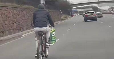Heartstopping moment cyclist spotted pedalling on five-lane M8 in Glasgow - www.dailyrecord.co.uk - Scotland