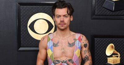 Harry Styles Shimmers in Rainbow Jumpsuit on Grammys 2023 Red Carpet After Olivia Wilde Split - www.usmagazine.com - Los Angeles