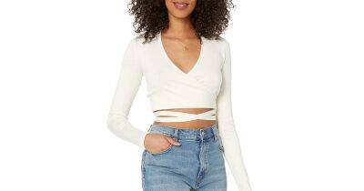 Buying ASAP! This Stunning Cropped Wrap Sweater Is 50% Right Now - www.usmagazine.com