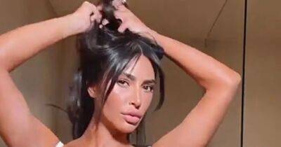Kim Kardashian Debuts Chic Curtain Bangs While Showing Off Sexy Skims Set: Photos - www.usmagazine.com - Los Angeles