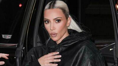 Kim Kardashian Gets Punched in the Eye by Son Saint While He Sleeps in Her Bed - www.etonline.com - Chicago