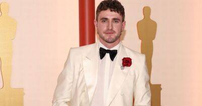 Paul Mescal serves Prom King realness in white Oscars tuxedo with red rose - www.ok.co.uk - Britain - county Butler