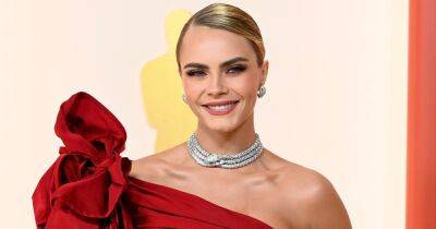 Cara Delevingne stuns show-stopping red Oscars gown after opening up on sobriety - www.ok.co.uk - Britain - London - Los Angeles
