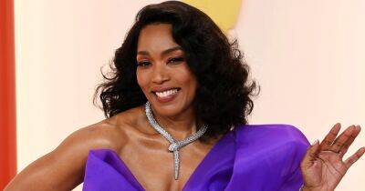 Angela Bassett Goes ‘Royal’ in Whimsical Purple Moschino Gown at 2023 Oscars: Photos - www.usmagazine.com - New York - Los Angeles - USA - Italy - county Jones - county Story - Columbia - county Turner