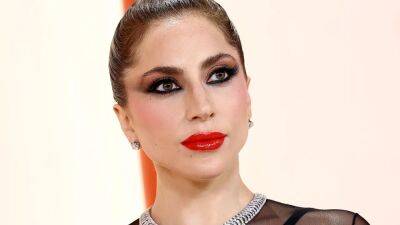 Lady Gaga Rushed to the Aid of a Fallen Photographer on the Oscars Red Carpet - www.glamour.com