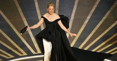 Elizabeth Banks Trips on Stage While Presenting During the Oscars, Jokingly Blames ‘Cocaine Bear’ - www.usmagazine.com - Los Angeles - county Banks