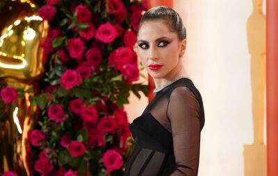 Lady Gaga branded “hero” for rushing to help photographer on Oscars red carpet - www.nme.com - county Maverick - county Hand