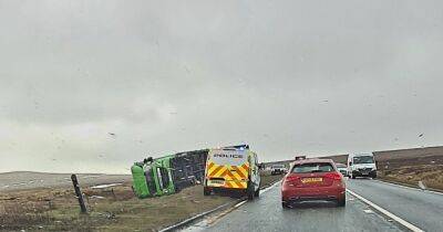 Woodhead Pass closed after lorry overturns in crash involving white van - www.manchestereveningnews.co.uk - Manchester