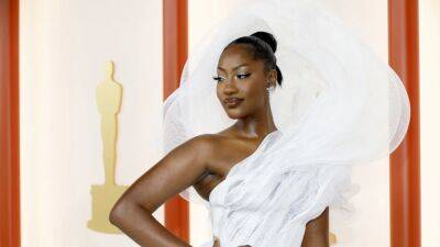 Tems Cheekily Responds to Critics of Her View-Blocking Couture Gown at 2023 Oscars - www.etonline.com
