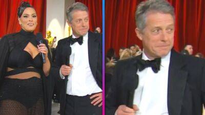 Ashley Graham Responds to Her Hugh Grant Interview at the Oscars Going Viral - www.etonline.com - Britain - Los Angeles - county Graham
