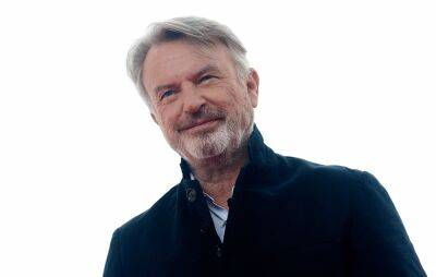 Sam Neill “back at work” after being treated for blood cancer - www.nme.com - New Zealand