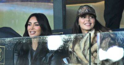 Kim Kardashian and Kendall Jenner sip wine as they watch football match in Paris - www.ok.co.uk - France - Paris - London - city Santos
