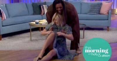 Holly Willoughby falls over on This Morning as Alison chases her around studio - www.ok.co.uk - Britain - city Sandler