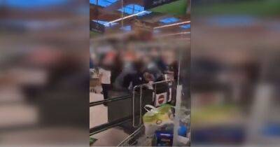 Three arrested after brawl at Asda self service checkout - www.manchestereveningnews.co.uk - Manchester