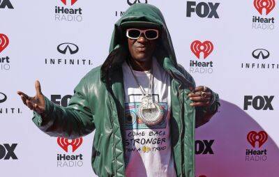 Flavor Flav confirms his “Swiftie” status at the iHeart Radio Music Awards - www.nme.com