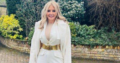Carol Vorderman rocks 'Elvis look' as she enjoys day out at Sandown Races wowing fans - www.dailyrecord.co.uk
