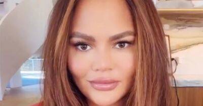 Chrissy Teigen Unveils Fierce Red Hair and Chic Layered Cut After Giving Birth to Baby Esti: Photo - www.usmagazine.com