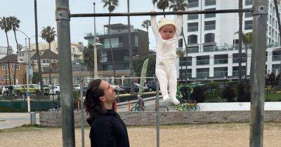 Joe Wicks hits back after being slammed for leaving baby daughter hanging on pull-up bar - www.ok.co.uk - Los Angeles - Santa Monica