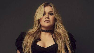 Kelly Clarkson on How New Songs Pulled Her 'Out of the Gutter' Amid Brandon Blackstock Divorce - www.etonline.com
