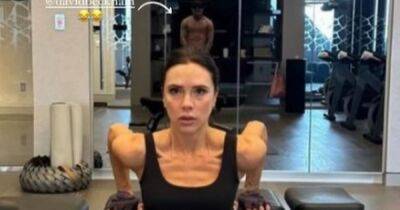 Victoria Beckham shows off muscles in gym but fans are distracted by David in background - www.ok.co.uk