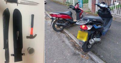 Two arrests after 'Rambo' knife and machete seized from masked moped riders - www.manchestereveningnews.co.uk - Manchester