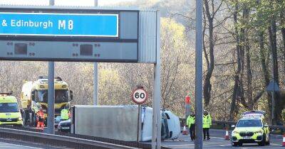Crash on M8 near Glasgow city centre leaves motorway closed after lorry overturns - www.dailyrecord.co.uk - Scotland - city Glasgow - Beyond