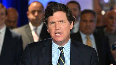 Tucker Carlson Told Colleagues He'd 'See Them on Monday' After Final Show at Fox News, Source Says - www.etonline.com - state Delaware