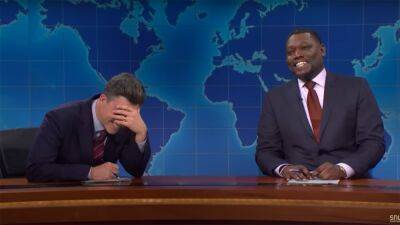 Michael Che Pranks Shocked Colin Jost on 'SNL by Convincing Audience Not to Laugh at His Jokes: Watch - www.etonline.com