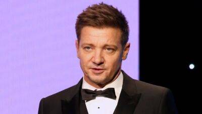 Jeremy Renner Jams out to Prince During Theme-Park Outing With Family - www.etonline.com - Los Angeles - California - Indiana - county Valencia - county Sawyer