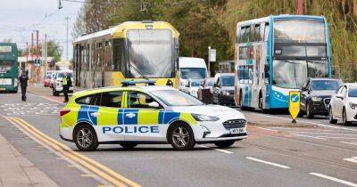 Person rushed to hospital after car and tram crash on busy road - www.manchestereveningnews.co.uk - Manchester